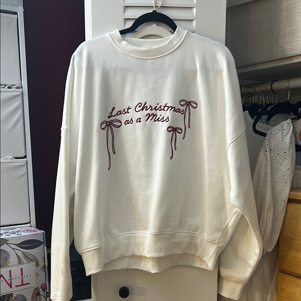 White Sweatshirt with Embroidered Text